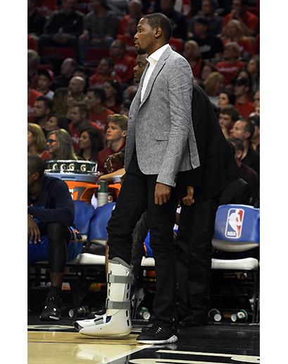 Kevin Durant watching the Thunder compete form the bench
Photo Credit: Steve Dykes/Getty Images