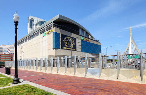 Boston, Massachusetts, USA - May 28, 2016: Daytime view of the Zakim Bridge over I93 and the TD Garden home arena for the Boston Bruins and Boston Celtics