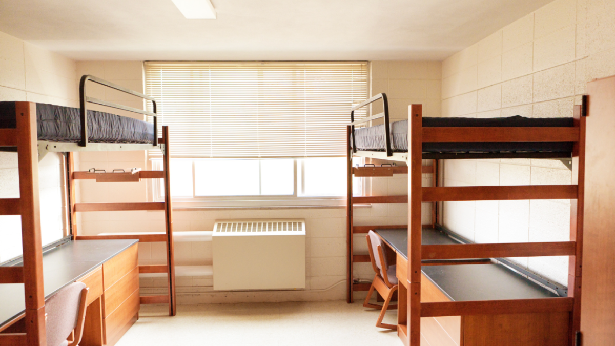 Image of a college dorm room. (Source: storagescholars.com)