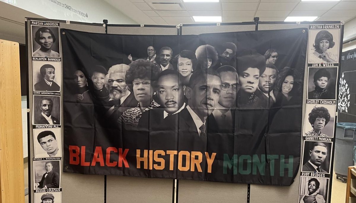 Image of a banner hanging in the Library during the Black History Month celebration. 