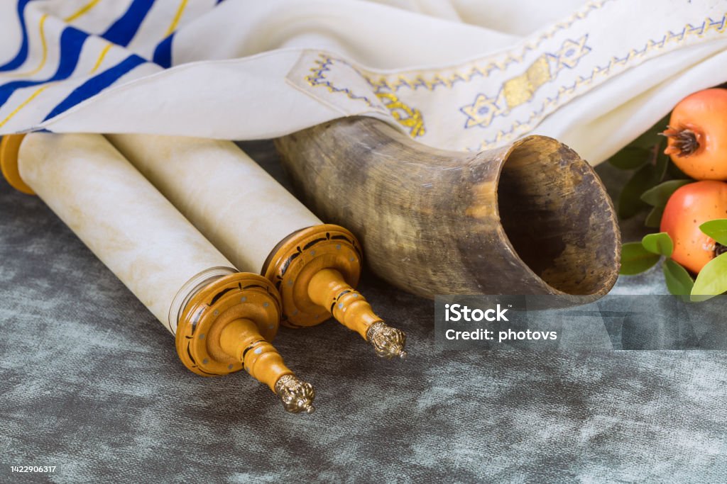 Yom Kippur traditional holiday symbols laid out on a table post-fast. 