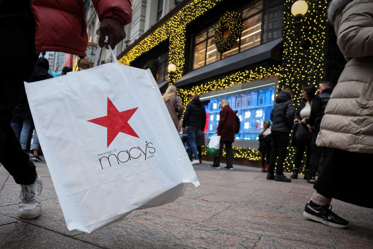 A customer exits the Macy's flagship department store in midtown Manhattan in New York City, U.S., December 11, 2023.  REUTERS/Brendan McDermid
